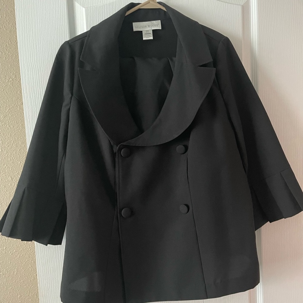 Women’s 2 piece black skirt and jacket shirt, size 16W, previously worn.